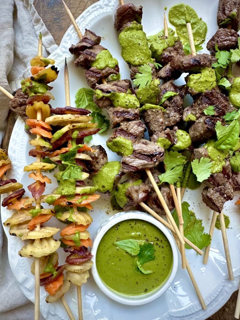 Grilled Steak & Rainbow Carrot Chips Kabobs with Spicy Green Sauce
